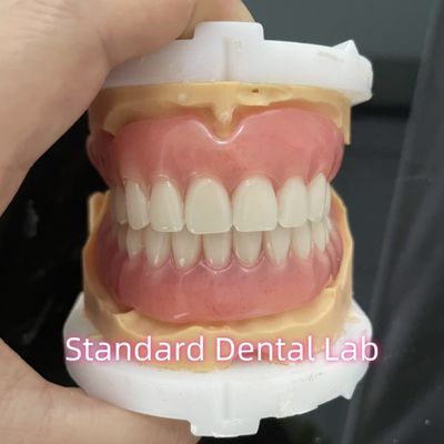 Phòng thí nghiệm nha khoa tiêu chuẩn OEM răng giả hoàn chỉnh có thể tháo rời dễ dàng để đưa vào và ra